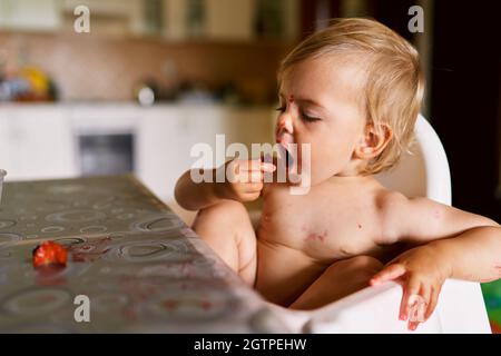 Cute Baby Girl On Bed At Home