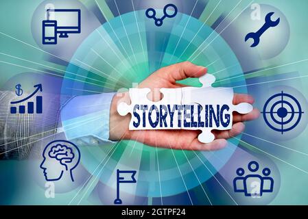 Inspiration showing sign Storytelling. Conceptual photo activity writing stories for publishing them to public Hand Holding Jigsaw Puzzle Piece Stock Photo