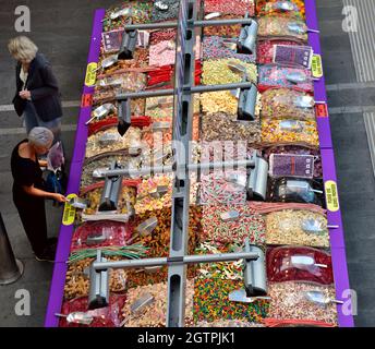Looking down on sales of selection of sugary pick and mix sweets Stock Photo