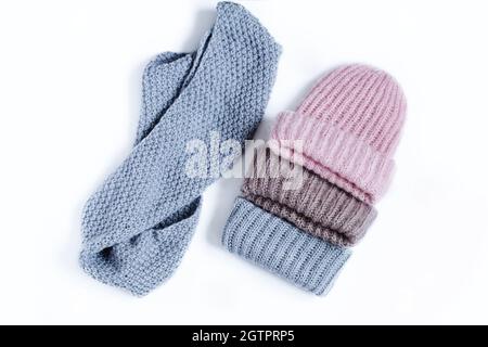 Set of knitted winter multi-colored hats top view Stock Photo