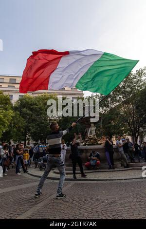 Milan, Italy - october 2 2021 - People holding banners at a rally against green pass and forced vaccination against covid in Italy 19 Credit: Christian Santi/Alamy Live News Stock Photo