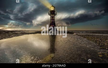 A fantasy compilation of the only wave swept cast iron tower of this size in Britain how it might have looked when it was working. Stock Photo