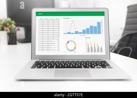 Laptop with charts, analyst works with data. Data analysis and statistics Stock Photo