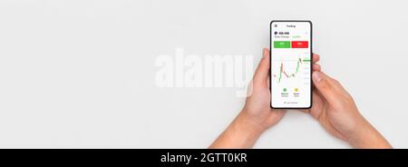 Invevstor using mobile trader app. Stock market, investment concept Stock Photo