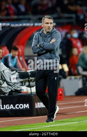 Nuremberg, Germany. 02nd Oct, 2021. Football: 2. Bundesliga, 1. FC Nürnberg - Hannover 96, Matchday 9, Max-Morlock-Stadion. Hanover coach Jan Zimmermann is watching the match. Credit: Löb Daniel/dpa - IMPORTANT NOTE: In accordance with the regulations of the DFL Deutsche Fußball Liga and/or the DFB Deutscher Fußball-Bund, it is prohibited to use or have used photographs taken in the stadium and/or of the match in the form of sequence pictures and/or video-like photo series./dpa/Alamy Live News Stock Photo