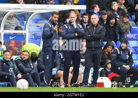 NOTTINGHAM, UK. OCT 2ND Nottingham Forest assistant coach, Steven Reid, Nottingham Forest assistant first team coach, Alan Tate and Steve Cooper, Nottingham Forest head coach during the Sky Bet Championship match between Birmingham City and Nottingham Forest at St Andrews, Birmingham on Saturday 2nd October 2021. (Credit: Jon Hobley | MI News) Credit: MI News & Sport /Alamy Live News Stock Photo