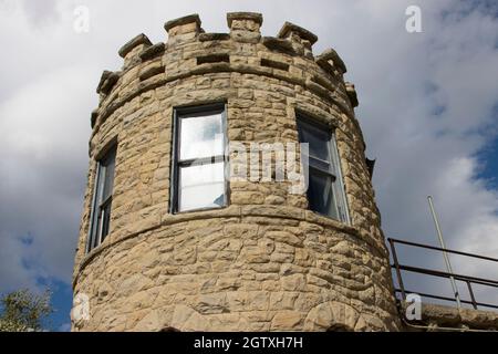 Guard tower on the wall of the historic old Montana State Prison in Deer Lodge, Montana Stock Photo