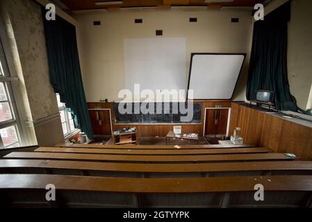 Abandoned lecture theatre inside a disused Zoology building of Liverpool University (Abandoned/Derelict) (Lecture Hall) Stock Photo