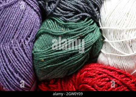 Multiple balls of yarn in different Colours Stock Photo