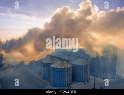 Harmful emissions from heavy industry are causing global warming and climate change. Stock Photo