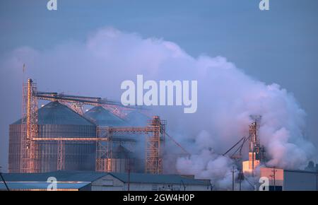 Harmful emissions from heavy industry are causing global warming and climate change. Stock Photo