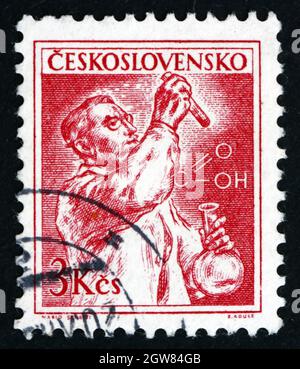 CZECHOSLOVAKIA - CIRCA 1961: a stamp printed in the Czechoslovakia shows Chemist, Scientist, circa 1961 Stock Photo