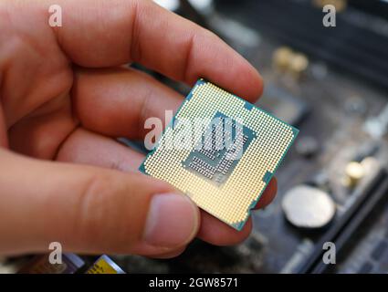 Working on the motherboard and pc processor Stock Photo