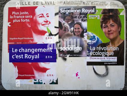 Election posters in Laval, Mayenne, France, 2007 Ségolène Royal became the first woman to be nominated as a presidential candidate by a major party. Stock Photo