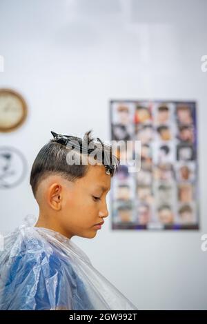 Small boy getting new haircut at home Stock Photo - Alamy