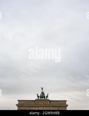 Berlin, Germany. 03rd Oct, 2021. Overcast skies can be seen over the Quadriga on the Brandenburg Gate on German Unity Day. The German Unity Day Act came into force on 4 August 1953. In future, 17 June was to be a statutory national day of remembrance to commemorate the uprising in the GDR in 1953. Since German reunification in 1990, the 'Day of German Unity' has been celebrated on 3 October. Credit: Paul Zinken/dpa/Alamy Live News Stock Photo