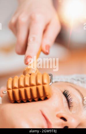 Maderotherapy face massage Stock Photo - Alamy