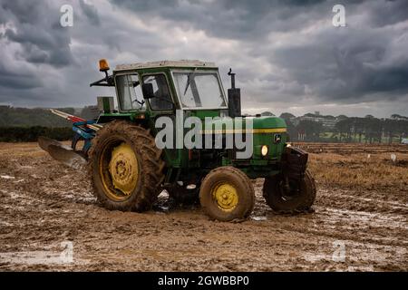 John Deere Tractor  in a Cornish field Stock Photo