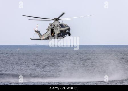 Maltese Air Force Agusta Westland AW-139 (REG: AS1429) making a demonstration of rescue at sea. Stock Photo