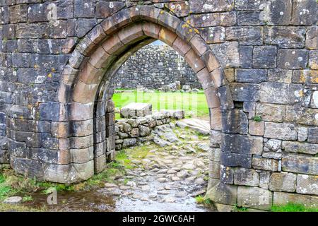 LOCH DOON, SCOTLAND - SEPTEMBER 18, 2019 :  A View through an archway of the internal  ruins of Loch Doon Castle South Ayrshire Scotland Stock Photo