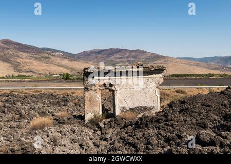 Near the town of Randazzo, Sicily, the remains of a house destroyed in 1981 by a lava flow from Mount Etna during a volcanic eruption that year Stock Photo