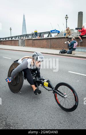 London, UK. 3rd Oct, 2021. (Eventual wheelchair race 9th place) Jenna Fesemyer (USA) passes mile 24 at Blackfriars in the London Marathon, the first time it has been held since April 2019 due to the Covid-19 pandemic. Over 36,000 elite athletes, club runners and fun runners are taking part in the mass event, with another 40,000 people taking part virtually. Credit: Stephen Chung/Alamy Live News Stock Photo