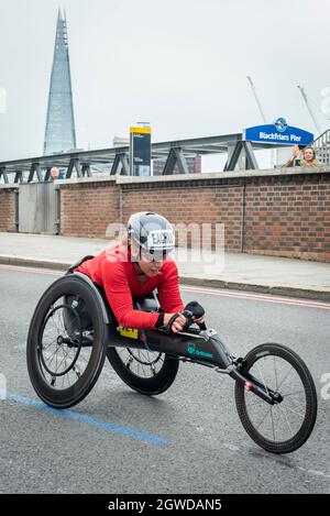 London, UK. 3rd Oct, 2021. (Eventual wheelchair race 8th place) Patricia Eachus (SUI) passes mile 24 at Blackfriars in the London Marathon, the first time it has been held since April 2019 due to the Covid-19 pandemic. Over 36,000 elite athletes, club runners and fun runners are taking part in the mass event, with another 40,000 people taking part virtually. Credit: Stephen Chung/Alamy Live News Stock Photo