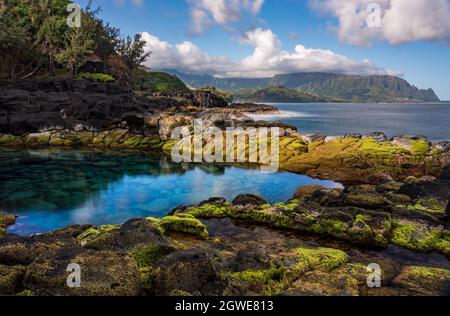 Long Exposure Of The Calm Waters Of Queen's Bath, A Rock Pool Off Princeville On North Of Kauai