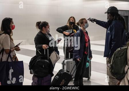 N.Y., New York, USA. 1st October, 2021. Passengers are screened for fever prior to boarding a Delta flight from JFK International Airport to Tel Aviv. Credit: Nir Alon/Alamy Live News. Stock Photo