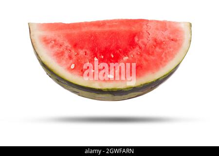 Watermelon slice isolated on a white background. Large fresh fruit cut open with red flesh inside Stock Photo