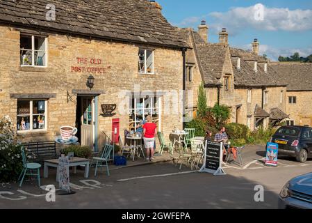 Guiting Power, Gloucestershire, England, UK. 2021.  Guiting Power voted on of England's best villages. Village centre with the Old Post Office & tea r Stock Photo