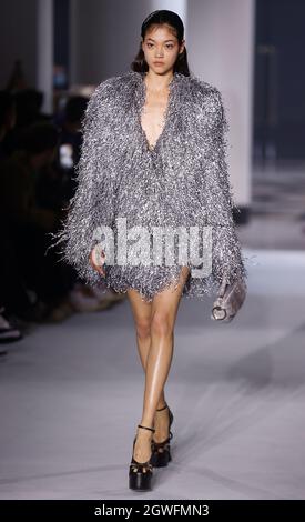 Paris, France. 3rd Oct, 2021. A model presents a creation during the Spring/Summer 2022 Ready to Wear collection for LANVIN presented as part of the Paris Fashion Week in Paris, France, Oct. 3, 2021. Credit: Xinhua/Alamy Live News Stock Photo