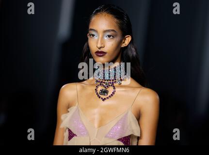 Paris, France. 3rd Oct, 2021. A model presents a creation during the Spring/Summer 2022 Ready to Wear collection for LANVIN presented as part of the Paris Fashion Week in Paris, France, Oct. 3, 2021. Credit: Xinhua/Alamy Live News Stock Photo