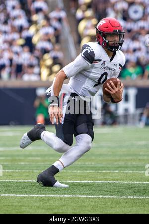 Desmond Ridder of the Cincinnati Bearcats runs the ball during the