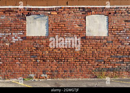Old brick wall in Midwest town. Stock Photo