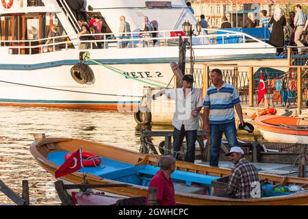 Istanbul, Turkey; May 26th 2013: Fishermen in the port of Eyüp. Stock Photo