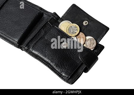 men's wallet in black color lies on a flat surface on a white background you can see different coins Stock Photo