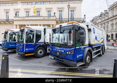 Dennis electric powered waste disposal vehicles for City of Westminster Clean Streets from Veolia on display in Pall Mall, central London Stock Photo