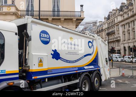 Dennis electric powered waste disposal vehicles for City of Westminster Clean Streets from Veolia on display in Pall Mall, central London Stock Photo