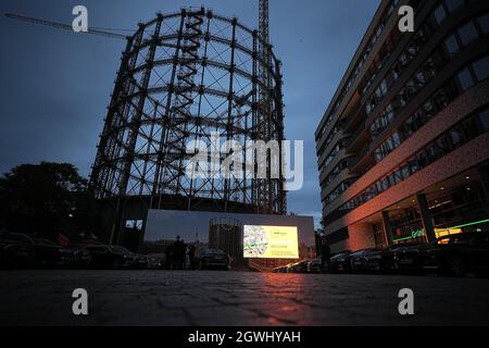 Berlin, Germany. 03rd Oct, 2021. The former gasometer at the EUREF Campus in the evening. The exploratory talks of the CDU/CSU and FDP take place here. Credit: Michael Kappeler/dpa/Alamy Live News Stock Photo