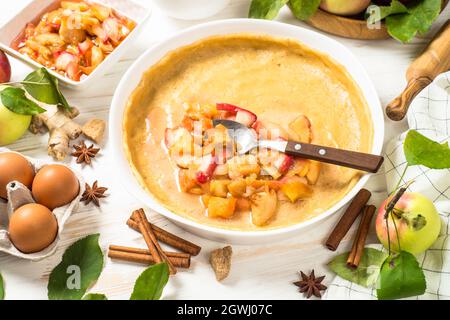 Apple pie with ingredients for cooking top view. Stock Photo