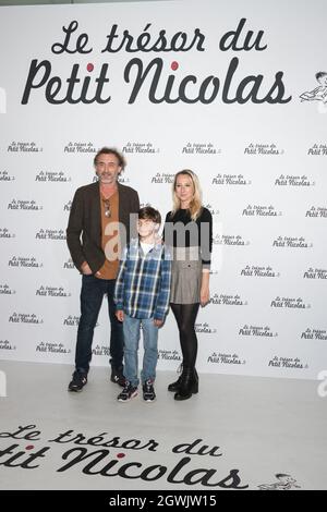 Jean Paul Rouve, French actor, Ilan Debrabant, French actor and Audrey Lamy, french actress, at the photocall of the first screening of the new movie Le Tresor du Petit Nicolas (Little Nicholas' treasure) held at the Grand Rex theatre. Paris, France, on October 3, 2021. Photo by DanielDerajinski/ABACAPRESS.COM Stock Photo