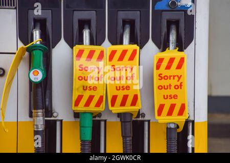 London, UK. 03rd Oct, 2021. 'Sorry, Out Of Use' signs cover the petrol pumps at a Shell station in Islington. Many UK stations have run out of petrol due to a shortage of truck drivers linked to Brexit, along with panic buying. Credit: SOPA Images Limited/Alamy Live News Stock Photo