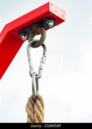 Climbing twisted rope ends with metal fastening on horizontal bar, workout  playground Stock Photo - Alamy