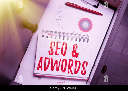 Conceptual display Seo And Adwords. Word Written on they are main tools components of Search Engine Marketing Thinking New Bright Ideas Renewing Stock Photo
