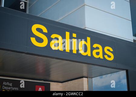 Tenerife, Spain - September, 2021: Departures (spanish: Salidas) gate sign at Airport Stock Photo