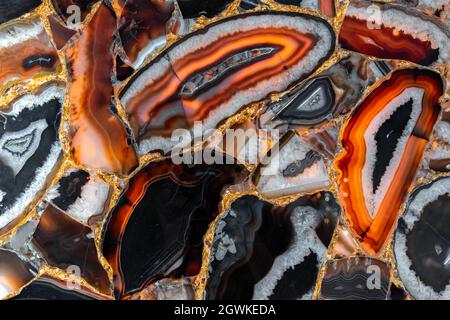Slices Of The Colorful Polished Semi-precious Stones. Semi Precious Stones Background.