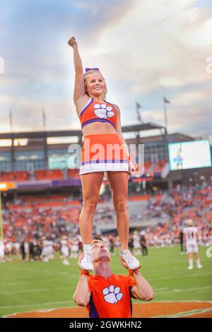 Clemson, SC, USA. 2nd Oct, 2021. A Clemson cheerleader performs for the crowd during the NCAA football game between the Boston College Eagles and the Clemson Tigers at Memorial Stadium in Clemson, SC. Kyle Okita/CSM/Alamy Live News Stock Photo