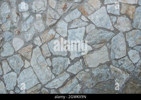 natural stone wall,  grey stone pattern Stock Photo