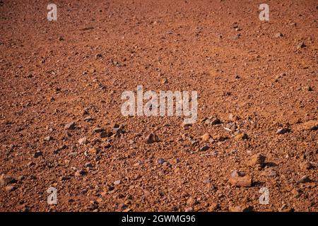 red sand and volcanic stones, Canary Island soil closeup Stock Photo